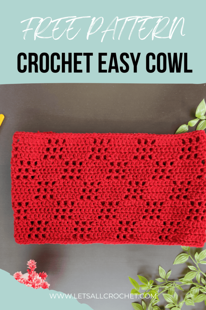 red cowl against blackish table with text free pattern crochet easy cowl