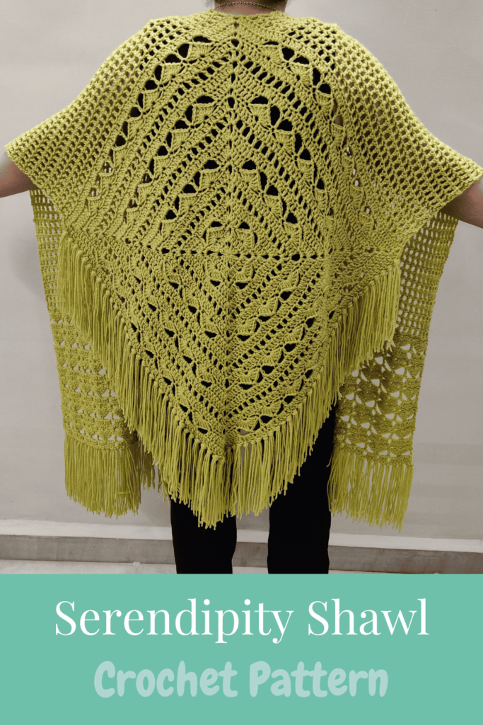 the back of the serendipity shawl which is a diamond shaped motif with shell pattern and fringes